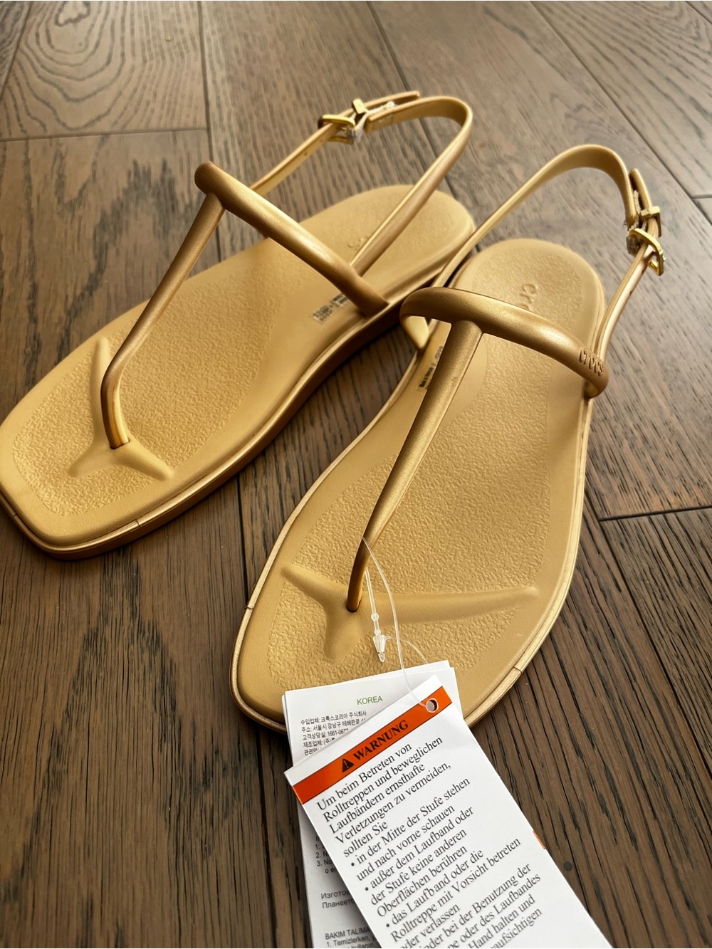 Brand new with tags Crocs Gold Slingback Toe-Post Sandals for Women, size 6